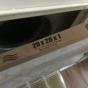 Removing a filter to perform DIY air conditioner maintenance Removing a filter to perform DIY air conditioner maintenance