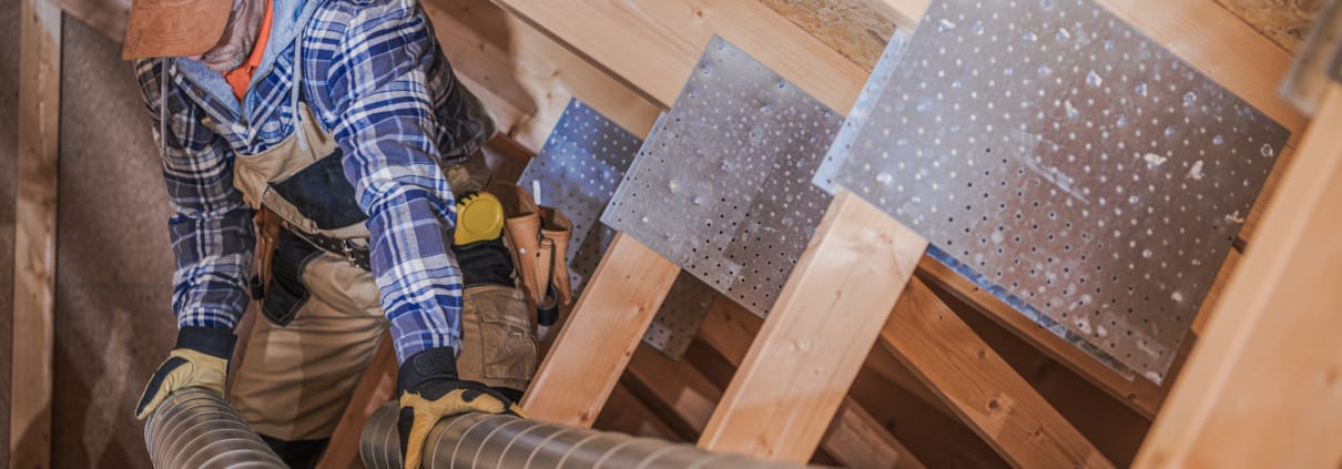 HVAC Technician Assembling Air Vent In House.