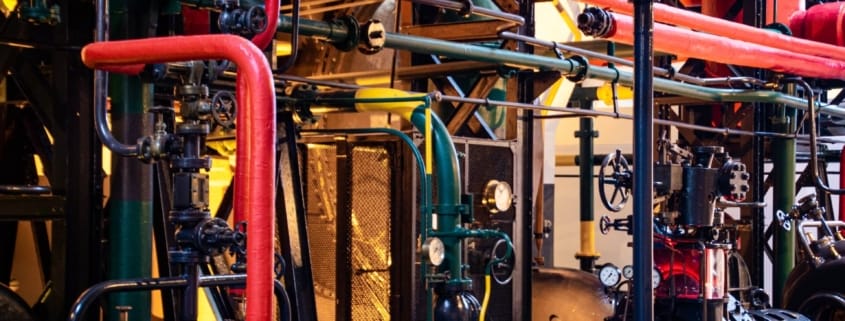 A large amount of pipes, ductwork, etc. representing the differences in heat pumps and traditional HVAC units alternatives.