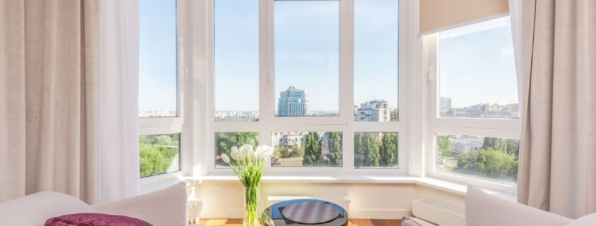 A nice living room in a cool home during the summer overlooking a urban part of Northern Virginia.
